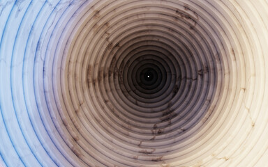 Marble tunnel with concentric rings creating a vortex effect