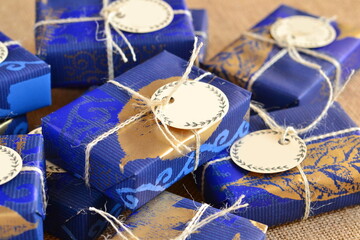 Christmas gift boxes blue golden color jute ribbon, winter wedding favors, new year party souvenirs, wrapped gifts, soap bar packaging, diy festive ideas, handmade homemade products for holidays
