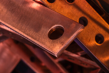 Copper flat busbars close-up, product of the non-ferrous metals industry