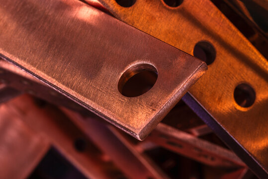 Copper flat busbars close-up, product of the non-ferrous metals industry