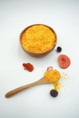 Bread crumbs in the wooden bowl and spoon