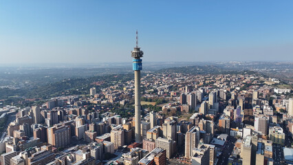 Obraz premium Hillbrow Tower At Johannesburg In Gauteng South Africa. High Rise Buildings Landscape. Megacity Background. Johannesburg At Gauteng South Africa. Downtown City. Urban Outdoor.