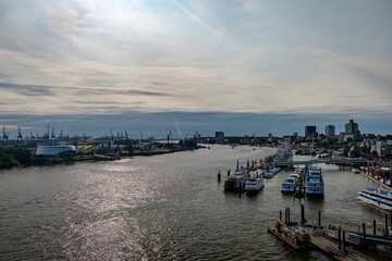 Fototapeta premium A sunset over the harbor city in Northern Germany. with clouds