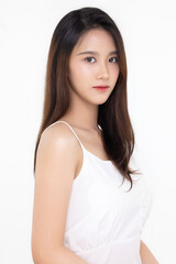 Beautiful young Asian woman with natural beauty make up style shows healthy and perfect skin on isolated background. Facial and skin care concept for commercial advertising.