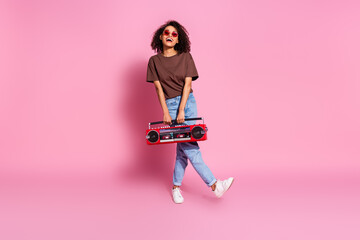 Photo of optimistic lovely cheerful girl wear brown stylish clothes dance chill vibe isolated on pink color background