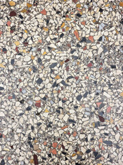Colorful terrazzo and cement flooring pattern