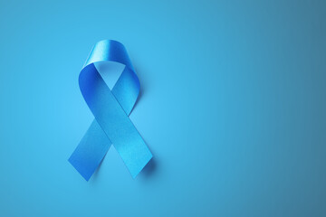 Blue ribbon on blue background, november health awareness concept, prostate cancer, diabetes day,...