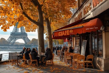 Obraz premium A serene café scene in Paris, with people enjoying their coffee under a canopy of autumn leaves, Eiffel Tower in the background