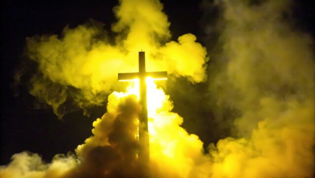 Silhouette of a Cross Emerging From Yellow Smoke