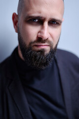Obraz premium Studio portrait of young handsome man with beard.