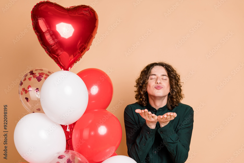 Poster photo portrait of handsome guy valentine day air balloons send air kiss dressed stylish green garmen