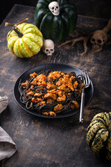Halloween dish black pasta with bolognese