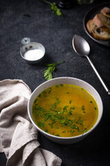 Chicken broth with parsley, healthy food