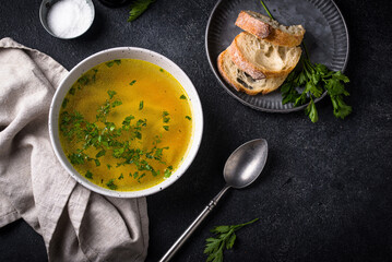 Chicken broth with parsley, healthy food