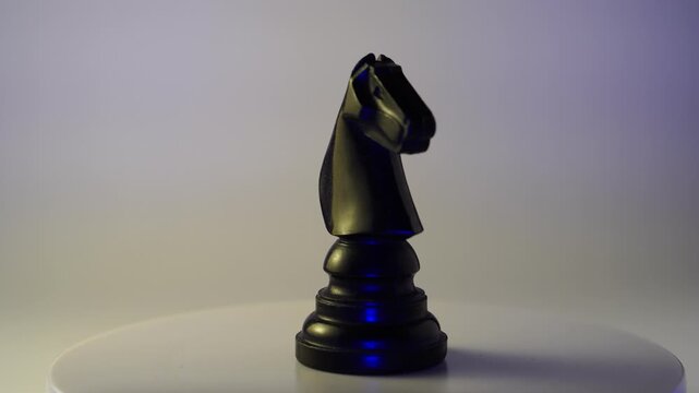 chess pieces turning spinning knight dark black