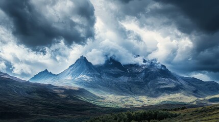 A dramatic sky over a mountainous landscape with heavy, dark clouds threatening rain. The imposing clouds and rugged peaks create a powerful and awe-inspiring natural scene.
