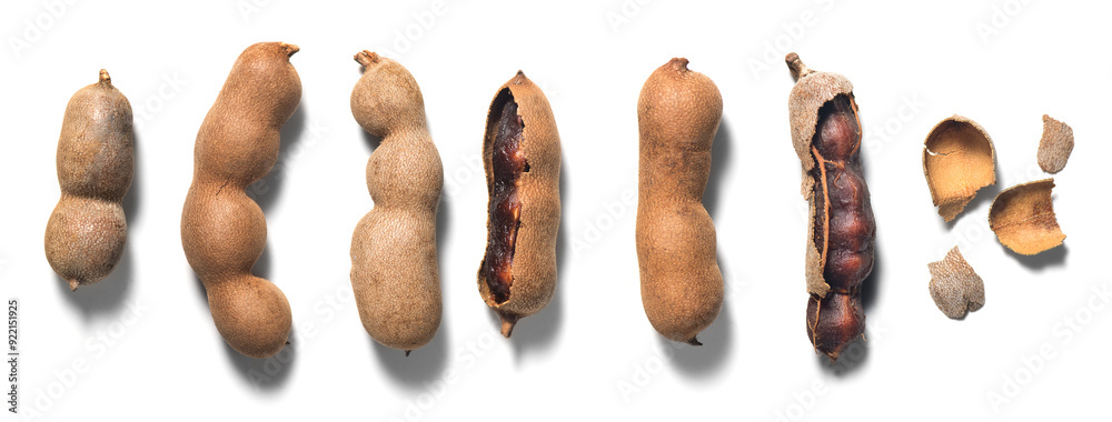 Wall mural set of tamarind tropical fruits isolated on white background. fresh ripe tamarind pods (tamarindus i