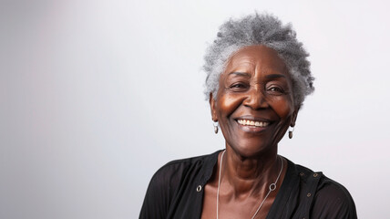 portrait of happy elderly black woman isolated on white background