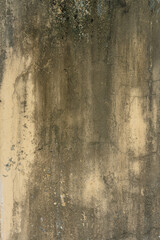 Vintage grunge wall with a rough, aged texture and a dirty, weathered appearance