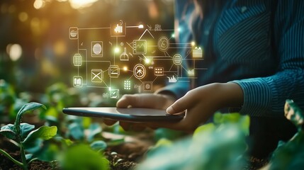 Person using a tablet among green plants, surrounded by glowing digital icons representing technology in agriculture at sunset