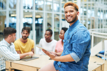 Obraz premium Business man, tablet and portrait in office for communication, networking and research with smile. Web designer, tech and creative in workplace for interface with ui or ux, development and website