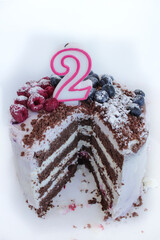 chocolate cake on a white background for a two year old