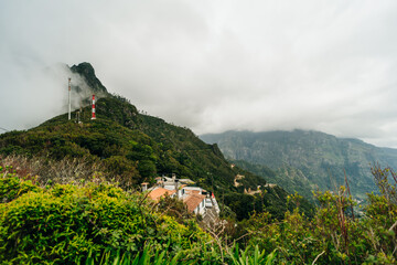 Magical misty green forest with waterfalls in Levada do Norte, Madeira island, Portugal. PR17...