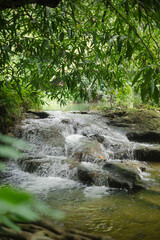 The beautiful waterfall named Namtok Chet Sao Noi is located in Saraburi province in central Thailand. It is popular among the local residents.