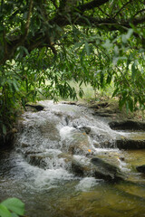 The beautiful waterfall named Namtok Chet Sao Noi is located in Saraburi province in central Thailand. It is popular among the local residents.