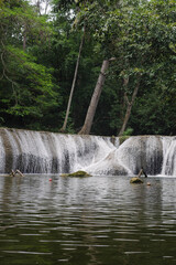 The beautiful waterfall named Namtok Chet Sao Noi is located in Saraburi province in central Thailand. It is popular among the local residents.