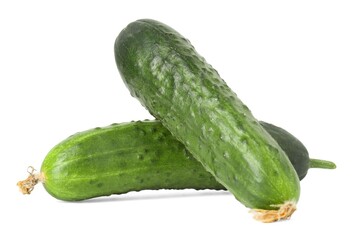 Two fresh green cucumbers isolated on white