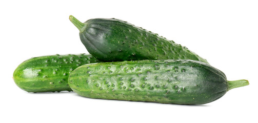 Three fresh green cucumbers isolated on white