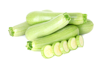 Fresh whole and cut zucchinis isolated on white, above view