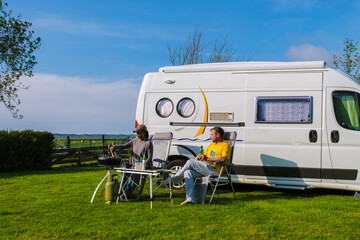 I am having a relaxing time by the RV, enjoying the beautiful scenery in Texel Netherlands