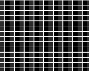 A black background with a pattern of small squares that are made of metal.
