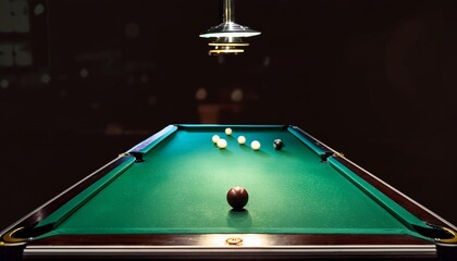 Empty green pool table with dark background and space for text