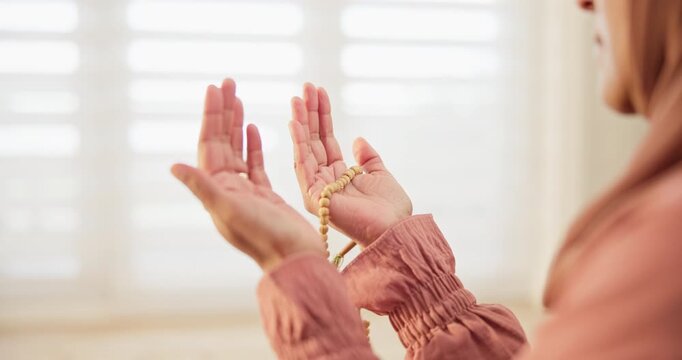 Muslim, beads or hands of woman in prayer to God in faith or devotion in islamic worship for Eid or ramadan. Reflection, peace or calm Arabic person in a house or home for fasting, help or wellness
