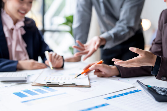 Business team is discussing financial results during a meeting in the office