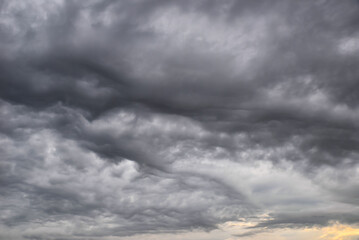 cloudy gloomy sky background, dramatic low rainy clouds