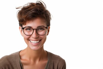 Obraz premium Radiant Confidence: Young woman with pixie cut and glasses beams a genuine smile, radiating joy and self-assurance. 
