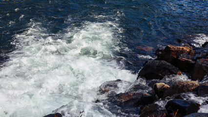 waves crashing on rocks