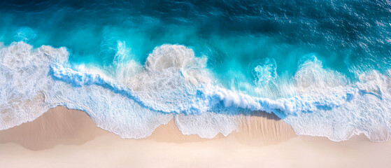 Fototapeta premium Aerial view of turquoise waves on sandy beach