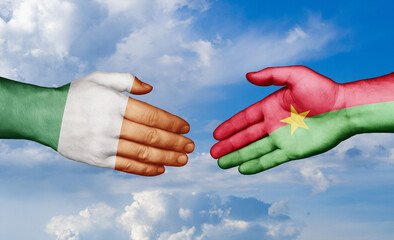 Burkina Faso and Ireland country handshaking with flags, consensus concept international co-operation illustration