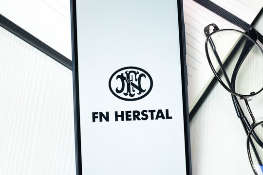 New York, USA - 10 August 2024: FN Herstal Logo on Phone Screen, Company Icon on Display