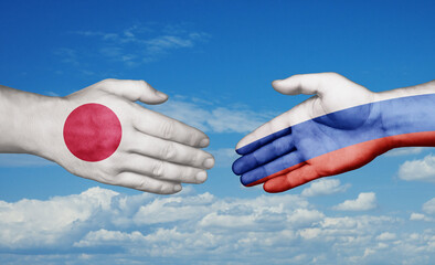 Russian Federation and Japan country handshaking with flags, consensus concept international co-operation illustration