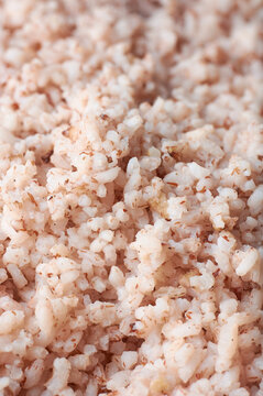 cooked kerala red rice, matta or rosematta rice in close-up, traditional variety popular in south india, food background in selective focus