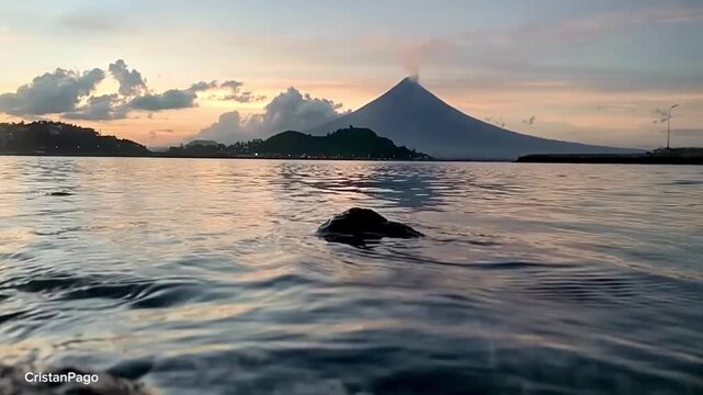 Mayon Volcano with sunset sunrise golden hour in legazpi city albay Bicol Philippines 