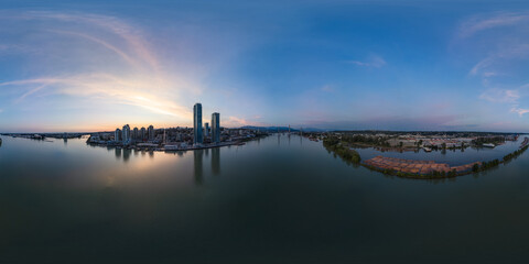 360 VR Modern City by river at sunset twilight. New Westminster, Vancouver, BC, Canada.