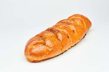 Golden brown jam-filled strudel, freshly baked and sprinkled with poppy seeds for a perfect treat