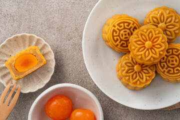 Cantonese moon cake for Mid-Autumn Festival food mooncake on gray table background.